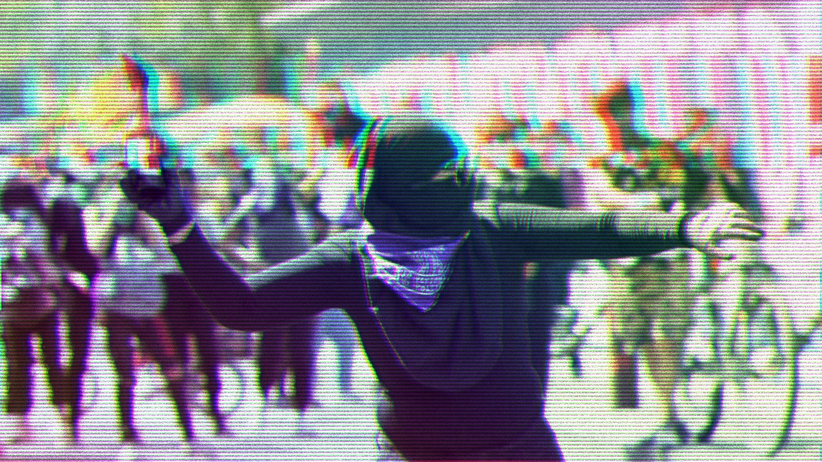 a woman in black with a purple bandana throwing a molotov cocktail. RGB shift and TV static distort the image.